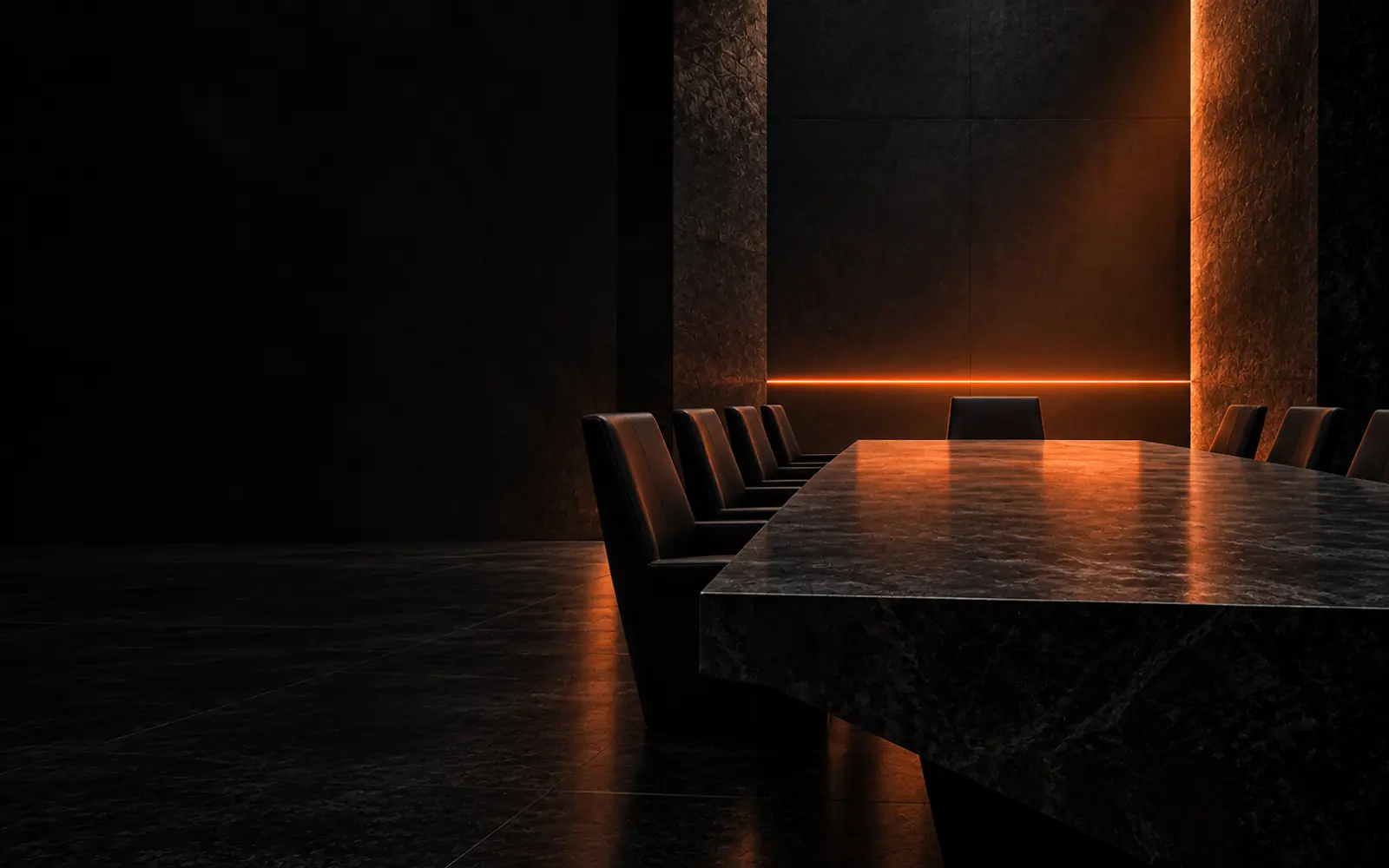 A long dark boardroom table under a thin ember horizon of light